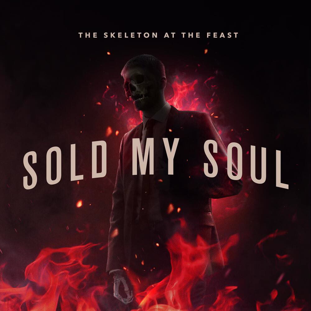 Sold My Soul artwork with a skull-faced man in a suit surrounded by red flames